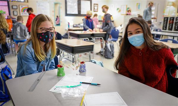 students work to build a bridge